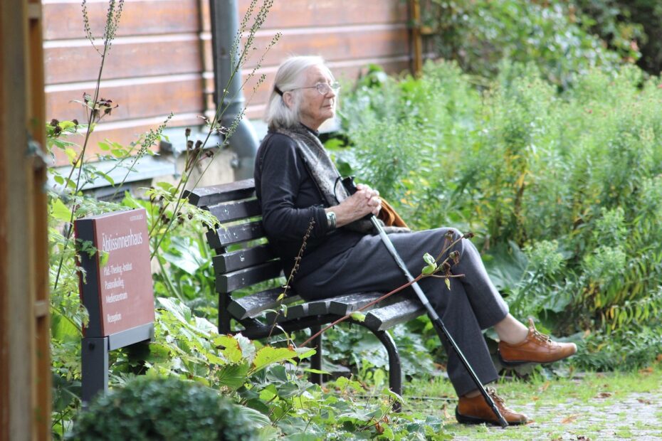 elderly woman on a bench